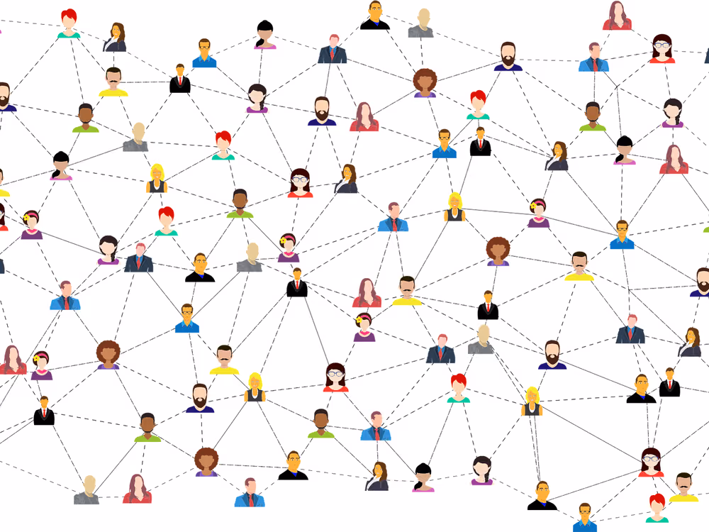 Illustrated people of many backgrounds, each joined to the next by lines, forming one large network.